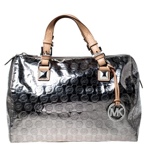 michael kors metallic purses|Michael Kors silver wallet.